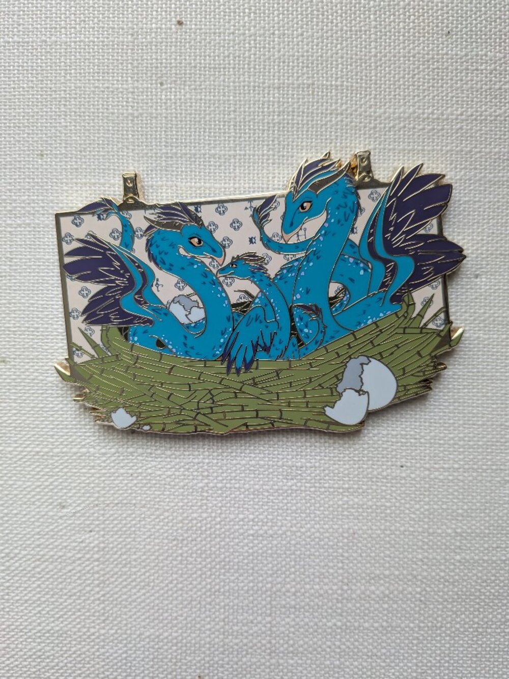 Occamys in Nest Pin
